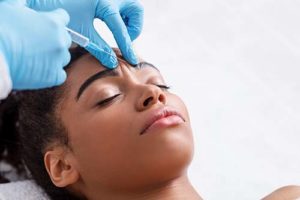 a woman receives a botox injection