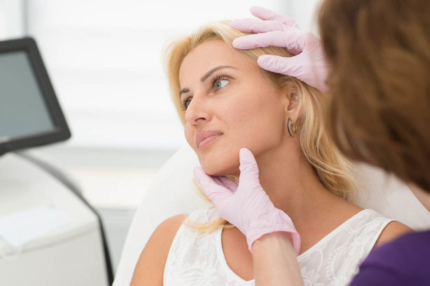 What Are Aesthetic Services and Do I Need Them a woman receives aesthetic services from a medispa