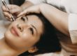 a woman receives microdermabrasion for skin at a medispa