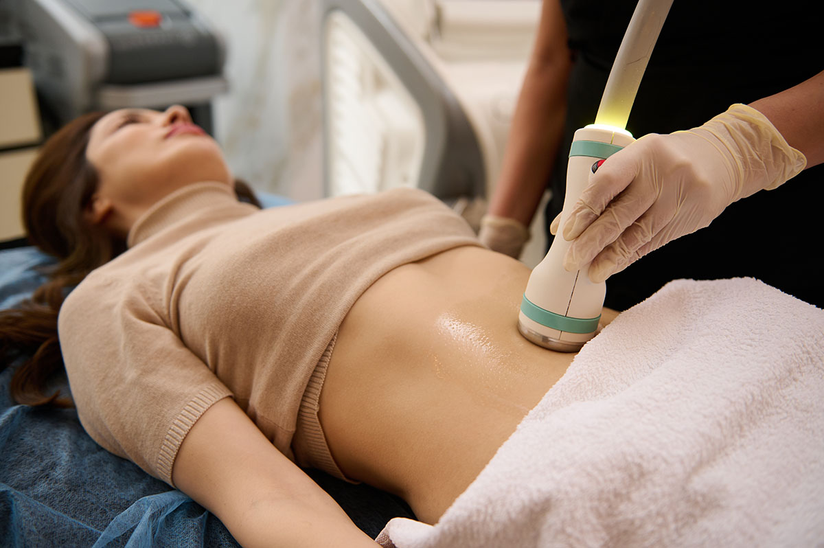 How Much is Body Contouring Patient lays down and receives body contouring after successfully asking "how much is body contouring".