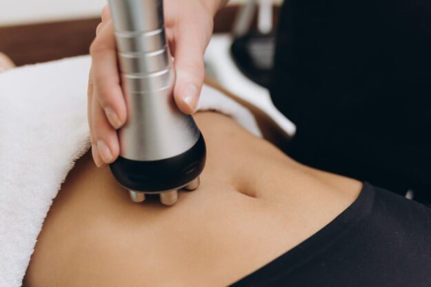 How Long Does Body Contouring Last Patient lays down and receives body contouring after successfully asking "how long does body contouring last?"