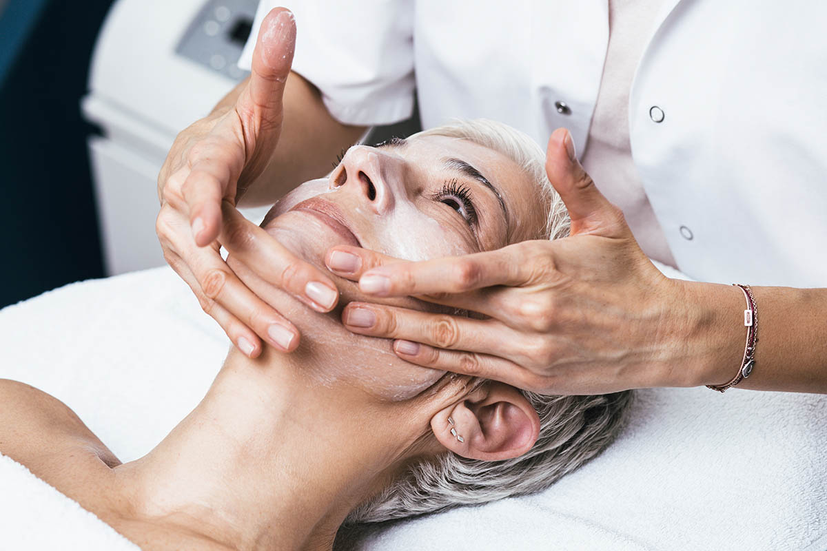 How Long Does Chemical Peeling Last Woman lays down at spa and receives chemical peeling after asking "how long does chemical peeling last?"